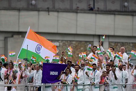 Team India travel along the Seine River during Olympics opening ceremony